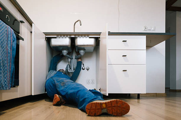 Professional Drain Cleaning technician working in Campbell, MO